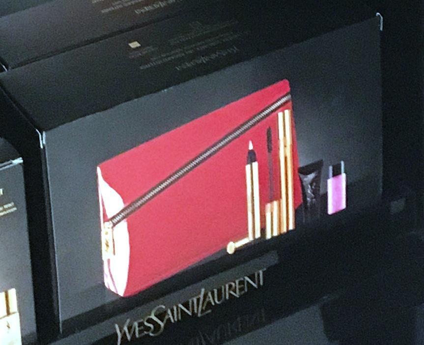 YSL 1. PU Make Up Pouch. 2. Pouch free with YSL Touche Eclat, Mascara, Moisture Glow and Make up Remover. Set cost 34.00 3.