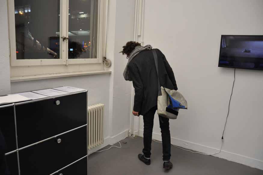exhibition at annex14 gallery Zürich, a man is looking
