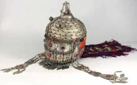 611 A 19th century Syrian ceremonial head dress and gown, the headdress of