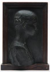 651 652 651 James Havard Thomas (1854-1921) head and shoulders portrait of a French woman, her hair tied in a bun, bronze plaque in relief, signed J. Havard Thomas, 1886, 29 x 18cm.