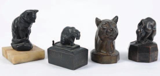 667, 668, 669, 670 667 After Bayre, a bronze model of a seated cat signed Bayre, mounted on a polished onyx base, total height 11.5cm.