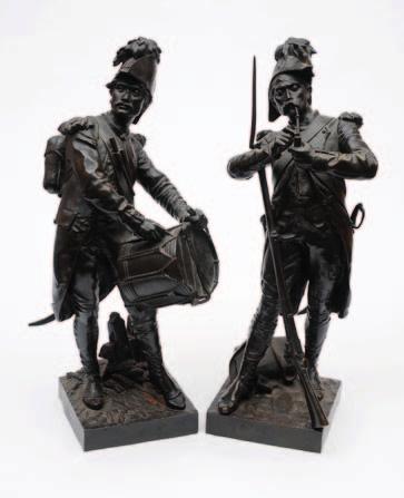 672 After H Dumaige, a pair of French bronze military figures each dressed in late 18th century uniforms, one holding a musket, the other holding a drum, mounted on