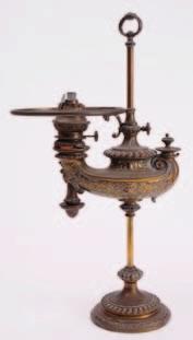 676 676 A 19th century brass Colza adjustable oil lamp in the form of a Roman lamp mounted on a central