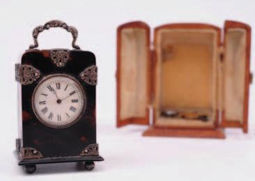 685 An Edwardian miniature tortoiseshell carriage clock the eight-day duration timepiece movement having a platform lever escapement and stamped on the backplate with the serial number 2850, the