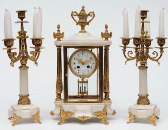 696 Vincenti et Cie, a French Victorian four-glass clock garniture the eight-day duration movement striking the hours and half hours on a gong with a twin mercury tube bob to the pendulum, the