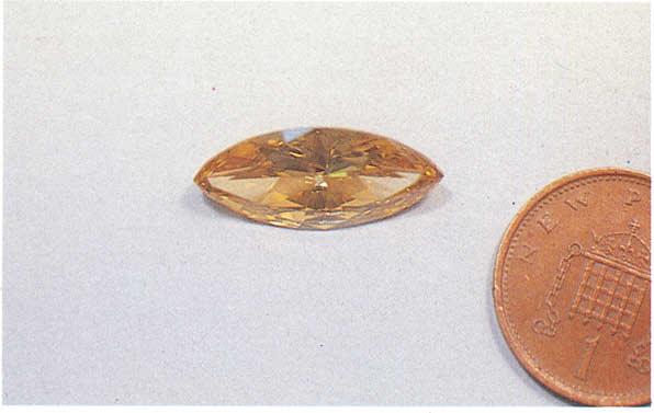 112 J.Gemm., 1984, XIX, 2 FIG. 17 A 6.00 ct treated'yellow diamond. y ~ ~... y.. gi- g... :~... 700 600 500 Nanometres b!