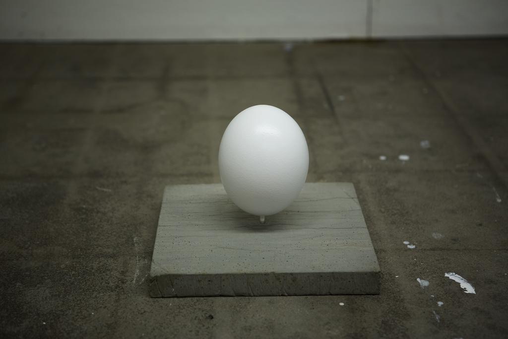 (Image 3) A concrete platform with painted egg.