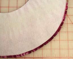 Align the inside curve of the interfacing to the inside curve of the brim. There should be ¼ of fabric extending beyond the interfacing on the outside curve.