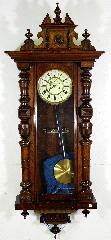 Lot # 507 507 508 509 510 511 512 513 514 515 516 517 518 Oak bracket style clock with brass dial. $100 - $150 Electric chime mantle clock. United Electric Clock with horse figure.