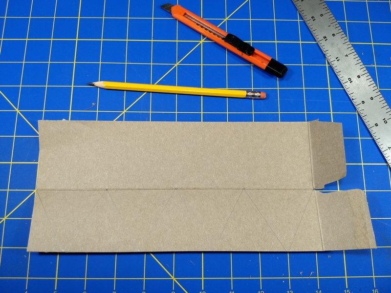 Make the Dreidel Cut Out the Cardboard Parts You'll need to cut out three cardboard parts to make the dreidel: