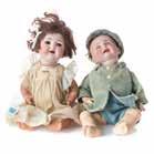 DOLLS 756 Two Kammer *Reinhardt bisque and composition dolls early 20th century; impressed K * R Simon & Halbig 36, 15 in H and similar 116/A boy doll, with corduroy jacket and matching hat, 15 in H