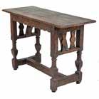 1116 1116a Russian oak chip carved table early 20th century; top, carved edge, scroll carved apron, carved legs connected by stretchers, 31 1/2 in H, 48 in W, 20 in D Est $1,200-1,500 to the Soviet