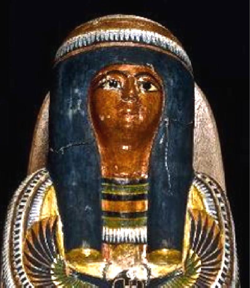 Her headdress is a classical design of the 21st dynasty but has a very wonderful wonderf decorations in about five colours and decoration bands over the whole area