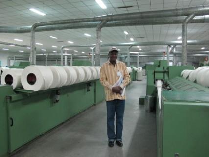 for Textile Industry) in Mali observes the machines and combing process Group photo and discussions between