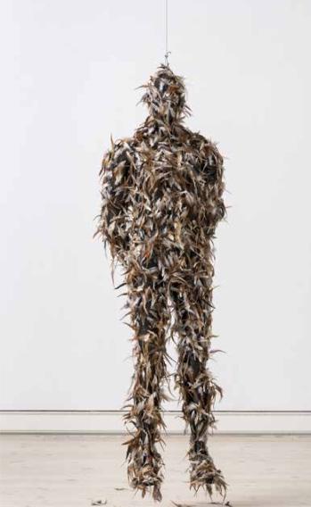 ANONYMOUS (man) Hanging mannequin, feathered and tarred 190 x 50 cm 2014