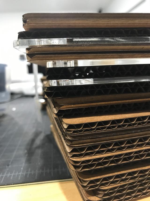 Below are files for laser cutting the wall sections. "Thin" is the shape we used to cut the walls out of plywood. "Thick" is the shape we used for the cardboard version.