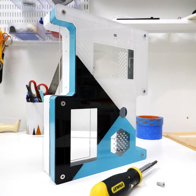 Laser Cutting Start by building the case: The case is made up of three laser cut acrylic panels separated by two 3D printed wall sections.