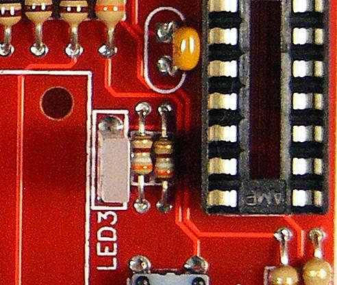 Step 15: Solder in the edge card socket into J2. Tip: Solder one pin on each side of the socket, then check for a flush fit against the board.