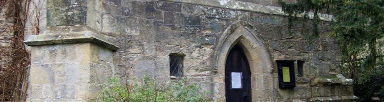 and relatively narrow lancet-arched doorway, as well as some of