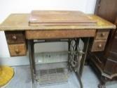Vintage Singer treadle sewing machine in wooden