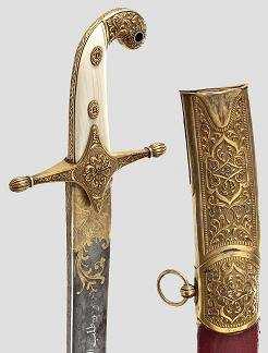 gold-inlaid dagger.