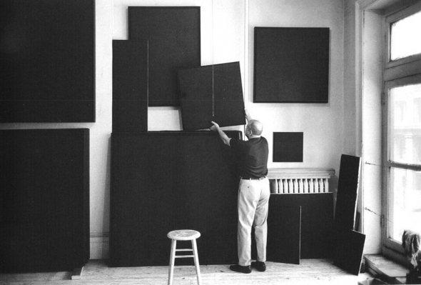 Ad Reinhardt with black paintings,