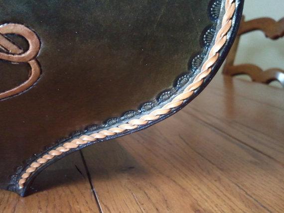 the braiding I used on the edges was created using the same methods employed by master craftsmen making horse saddles in the 1800`s before they had