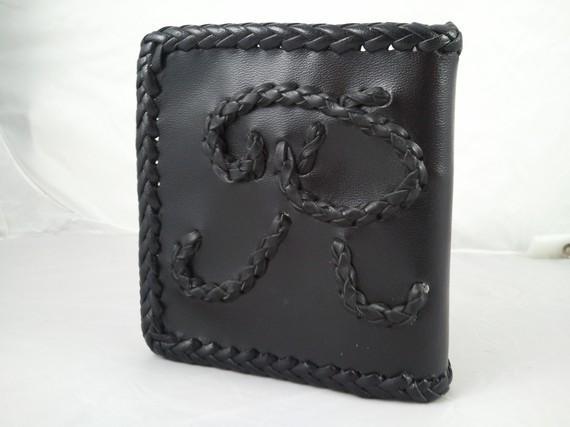 Mens Black Corner Fold Wallet 161.00$ USD http://www.etsy.com/listing/72296070/mens-black-corner-fold-wallet Own it today, carry it a lifetime. I can braid any initial of your choice on your wallet.