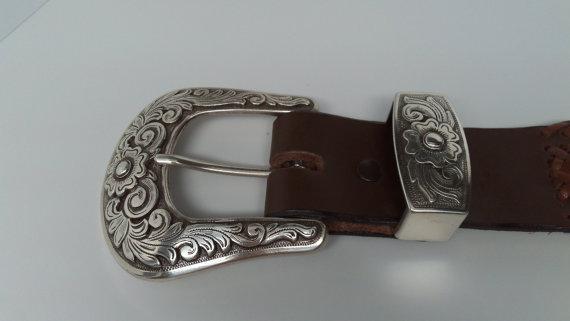 brown and the braid is a medium brown Buckle, Belt Keeper: Beautiful match set enhances this one of a kind uniquely braided
