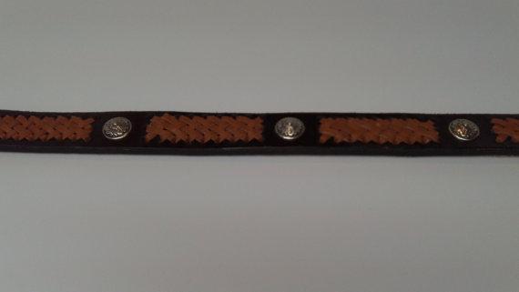 Size: 32 Width: 7/8 inch Color: The belt is a dark brown and the braid is a