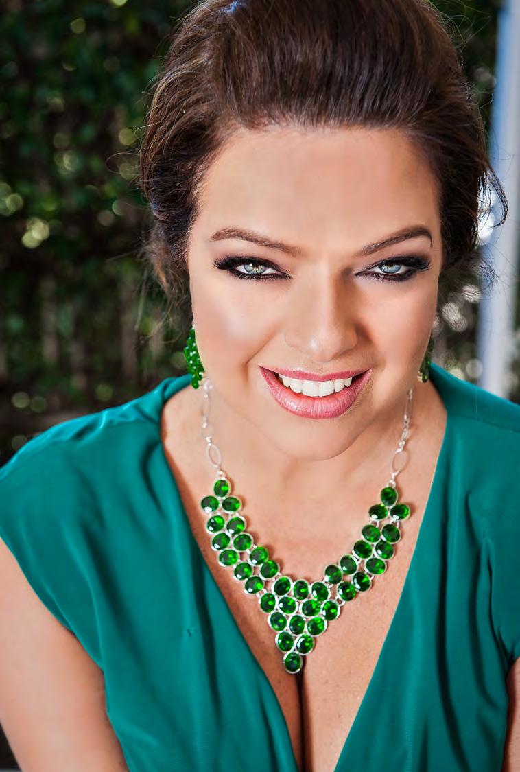 Green Goddess Collection 2 3 Nicole is wearing Green Goddess Collection CZ Necklace and the Green Goddess Collection CZ Chandelier Earrings.