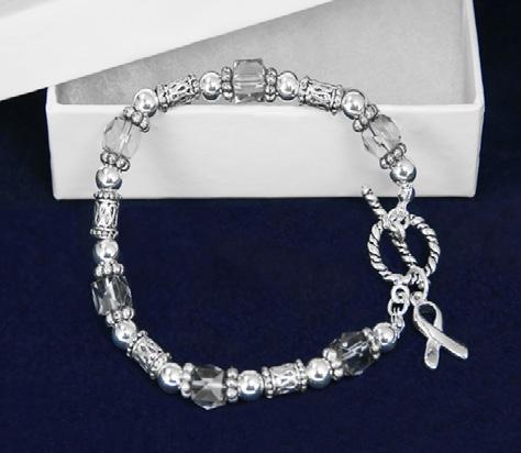 Gray and silver plated beaded stretch bracelet with a silver ribbon charm. Comes in optional gift box.