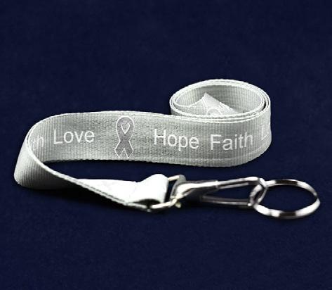 Each 4 inch gray ribbon magnet has the words Find The Cure.