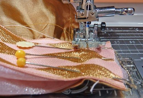 8. Fold this ½" seam allowance towards the center of the waistband and stitch the seam