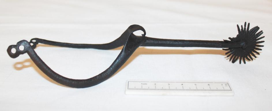 Figure 68 Rowel spur FO 203045 after conservation Finds from the ditches included iron objects (nails, a possible ice cleat, a rowel spur, a whittle tang knife and a chisel), a copper alloy decorated