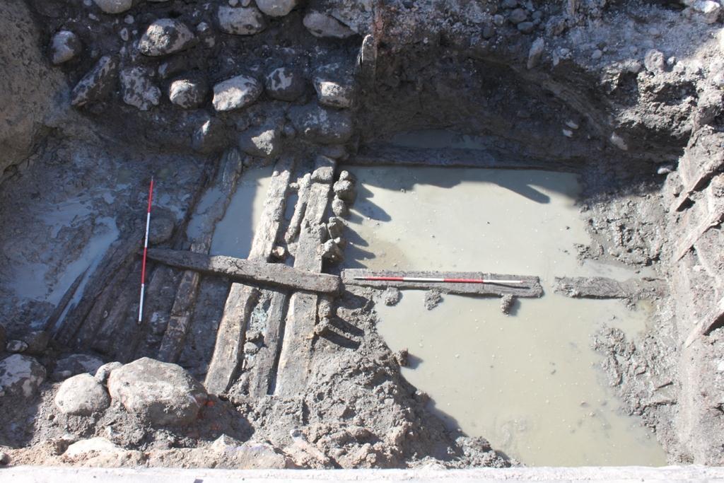 moat (Subgroup 405), and potentially on the east also (this was not seen due to excavation constraints).