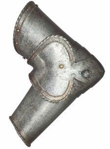 front fitted with a pair of latten eyelets for arming-points, the upper and lower edges decorated with notched inward turns accompanied by finely etched borders of interlinked, foliate-tailed