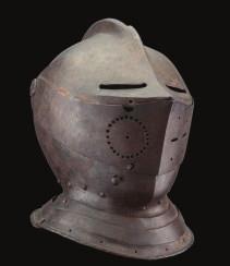 229 A CLOSE HELMET IN LATE 16TH CENTURY STYLE, MODERN with two-piece skull joined at a roped comb, fitted at the nape with a plume-holder and rear neck-guard of two lames, visor pierced with two