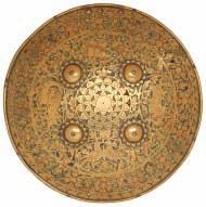 with a border of gold koftgari foliage within linear frames (small chips and losses) the first: 39cm; 15G in (4) 600-800 70 71 TWO INDIAN SHIELDS, DHAL, 19TH CENTURY of characteristic form, the first