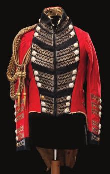159 159 A LIEUTENANT-GENERAL S FULL DRESS COATEE, 1811-25 of scarlet wool, with dark blue lapels, cuffs and collar patches; gold embroidered loops to the sleeves, lapels and