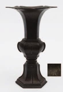 630 A Chinese bronze vase, Gu of hexagonal form with lotus petal rim, the middle and lower sections cast with raised flanges, 17th century, 27cm high [base re-attached].