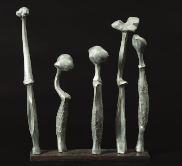 725 725 Austin Wright (British, 1911-1997), Five Seedheads aluminium on wooden base, bears labels for the