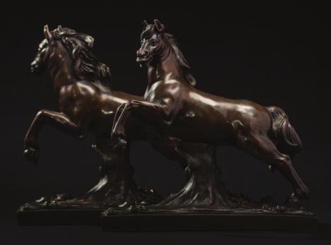 729 A fine pair of Italian bronze models of horses in the manner of Francesco Fanelli, each rearing horse