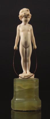 base, circa 1925, crack to ivory at base, overall height 16cm.