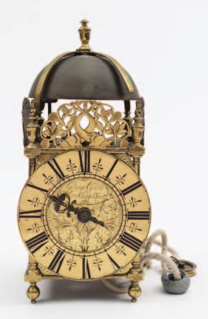 inch cream painted dial with black Roman numerals, brass heart hands and a moulded surround, the lacquered case with gilded decoration and painted with a scene to the trunk door depicting an elderly
