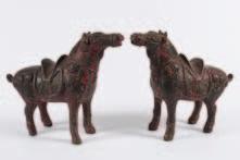 624 A pair of Chinese painted cast iron horses each with ornate saddle and tack, 20 cm high.