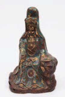 robes, holding a scroll in her right hand and seated on a rocky mound base, 31 cm high.