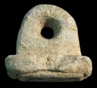 94 Although the material visually looks like Cypriot limestone, 95 the specific shape of the seal as well as the choice of material would be unusual for a Cypriot seal.