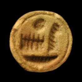 Figure 7 Unfinished(?) conoid seal in black stone. Philadelphia, University of Pennsylvania Museum of Archaeology & Anthropology E27.