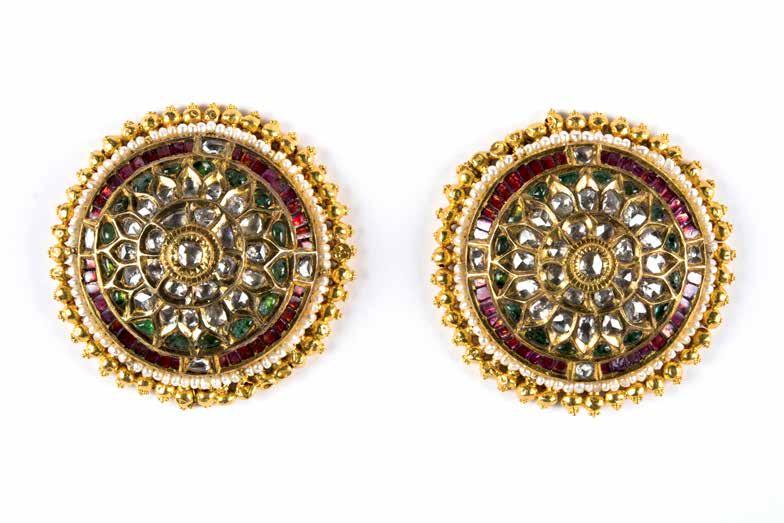 34 Ear ornaments, Toti India, Gujarat, Kutch, 18 th century A precious pair of gold ear ornaments, Toti or Karnphul (flower), with a gently convex shaped front plate kundan set with